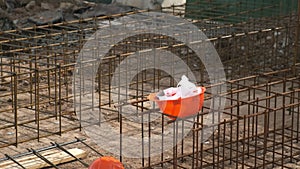 Ground floor of building under construction waits for concrete slab pouring.