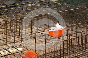 Ground floor of building under construction waits for concrete slab pouring.