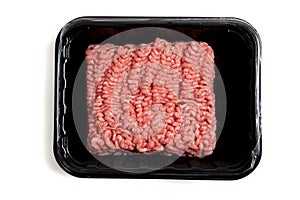 Ground hamburger meat on a white background