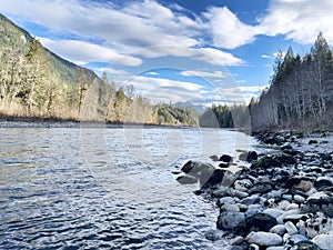 Ground level view of the glacier Sauk river in the Cascades of Washington state in early winter