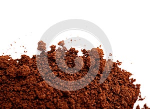 Ground milled coffee powder isolated over white background