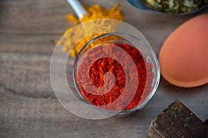 Ground red culinary condiment made from annatto Bixa orellana