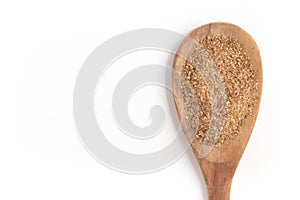 Ground Wheat into a spoon. Trigo para quibe. Kibbeh photo