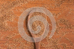 Ground Wheat into a spoon. Trigo para quibe. Kibbeh photo