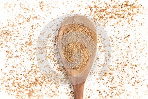 Ground Wheat into a spoon. Trigo para quibe. Kibbeh photo