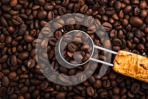 Grounded coffee, beans, coffe maker and spicces