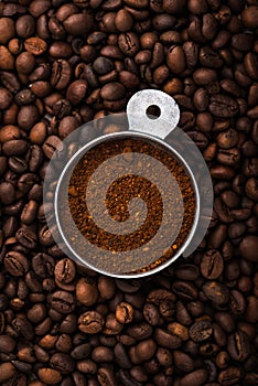 Grounded coffee, beans, coffe maker and spicces