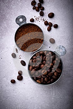 Grounded coffee, beans, coffe maker and spicces
