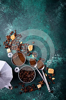 Grounded coffee, beans, coffe maker and spicces