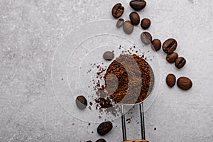 Grounded coffee, beans, coffe maker and spicces