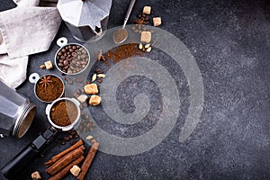 Grounded coffee, beans, coffe maker and spicces