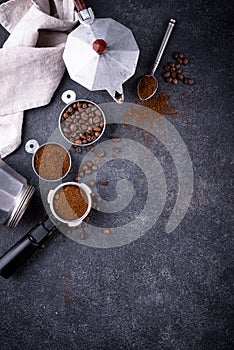 Grounded coffee, beans, coffe maker and spicces