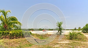 grounds preparation to build a new resort complex for tourists, construction zone, dump truck in background