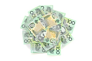 Group of 100 dollar Australian notes pile on white background