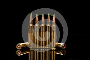 A group of 5.56 calibar, green tip bullets