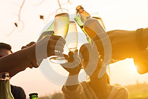 Group of 6 teenager have dinner party celebrating at sunset with