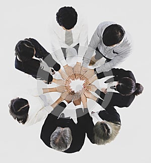 Group of 7 business people standing together and touch their han