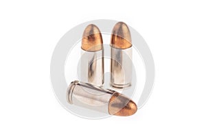 A group of 9mm bullets isolated on a white background