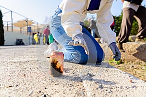 Group of activists clean and collect garbage from nature to keep the pollution environment clean