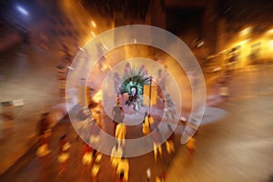 Group of actors, playing on scene in theater. Radial blur effect