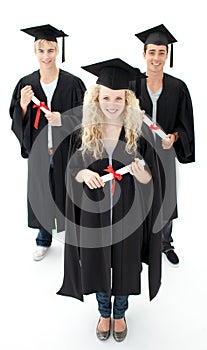 Group of adolescents celebrating after Graduation