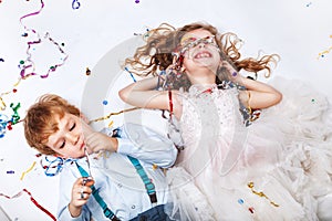 Group of adorable kids having fun at birthday party