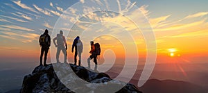 Group of adventurous hikers enjoying mountain sunset trekking in summer nature trail