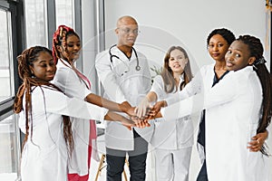 group of african american doctor and nurse in hospital ward.