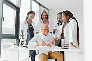 group of african american doctor and nurse in hospital ward.