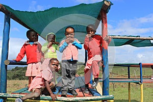 Group of African children playing outdoors in a playground, Swaziland, southern Africa