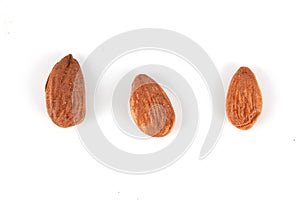 Group of almonds on white background