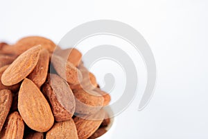 Group of almonds on white background