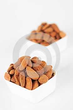 Group of almonds on white background