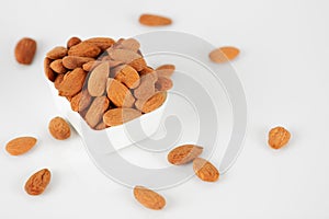 Group of almonds on white background