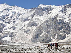 A group of alpinists is in the mountains