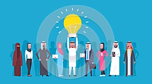 Group Of Arabic Business People With Leader Holding Light Bulb New Idea Concept Arab Businessman And Businesswoman
