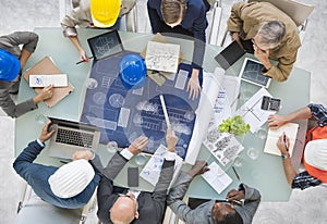 Group of Architects Planning with Blueprint photo