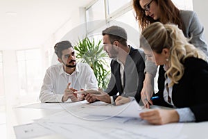 Group of architects working together on project