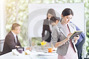 Group Asian Business people with casual suit working and brainstorming together in the modern Office, people business group and