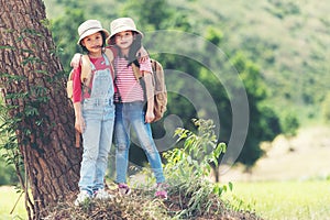 Group asian family children raise arms and standing see the outdoors, adventure