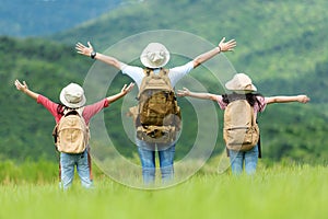 Group asian family children raise arms and standing see the outdoors, adventure and tourism for destination and leisure trips with