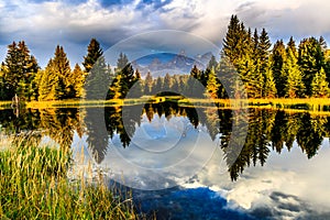 View of Snake River with Cloud Reflections