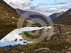 Group of Backpackers Trail, Autumn in Alaska Valley