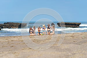 group of beautiful young women sitting