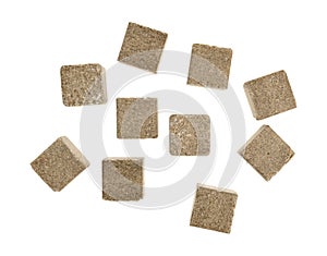 Group of beef flavored bouillon cubes on a white background