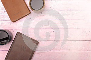 Group Bible Study with Coffee on a Pink Wooden Table