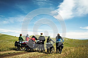 Group of bicyclists going on road