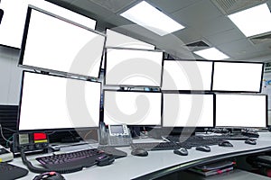 Group of blank monitors and screen on security desk or control room for monitor process or stock data trading