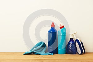 Group of blue cleaning products on white background