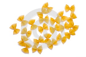 group of bow tie pasta isolated on white background close up